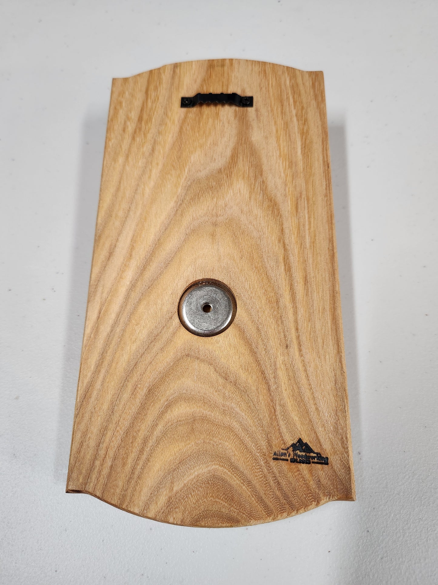 Bottle opener with magnetic back